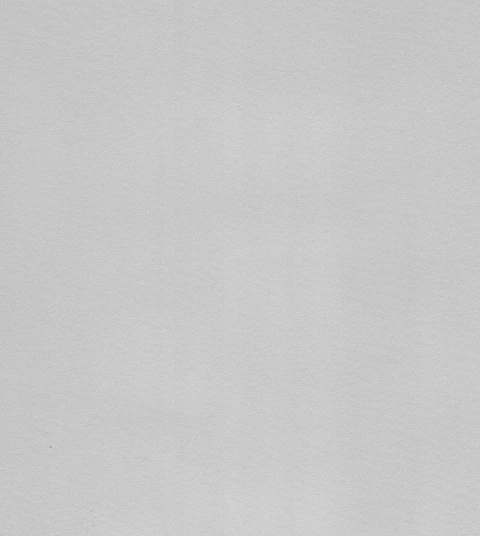 QTM-F01 appearance reference showing a light gray field with subtle fine texture